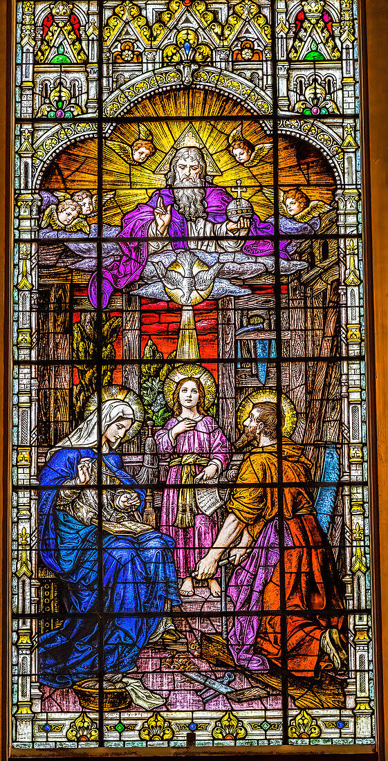 Young Jesus, Mary, Joseph and God the Father stained glass Gesu Church, Miami, Florida. Built 1920's Glass by Franz Mayer.