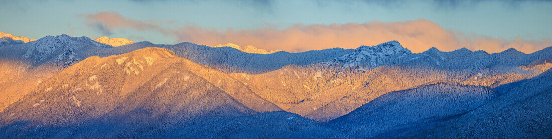 USA, Washington State. Panoramic of sunrise on Olympic Mountains in winter.