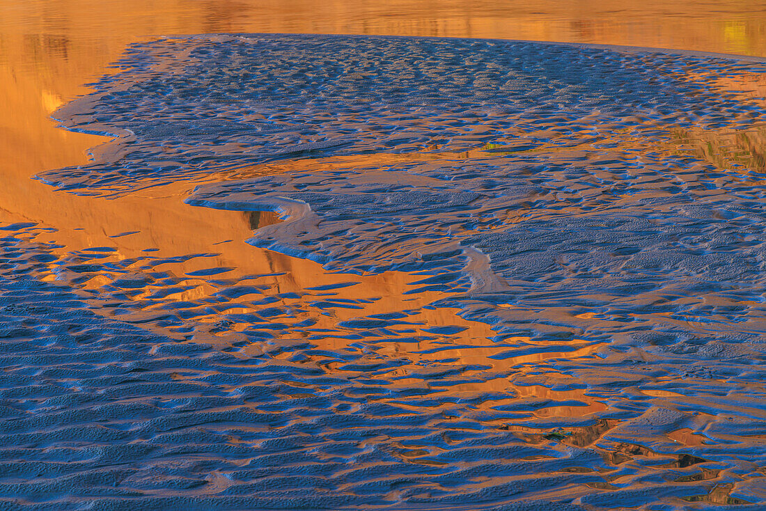 USA, Washington, Copalis Beach, Iron Springs. Patterns in beach sand at sunset.