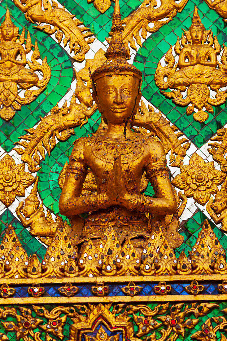 Thailand, Bangkok. Small sculpture detail at Wat Phra Kaew (Temple of The Emerald Buddha).