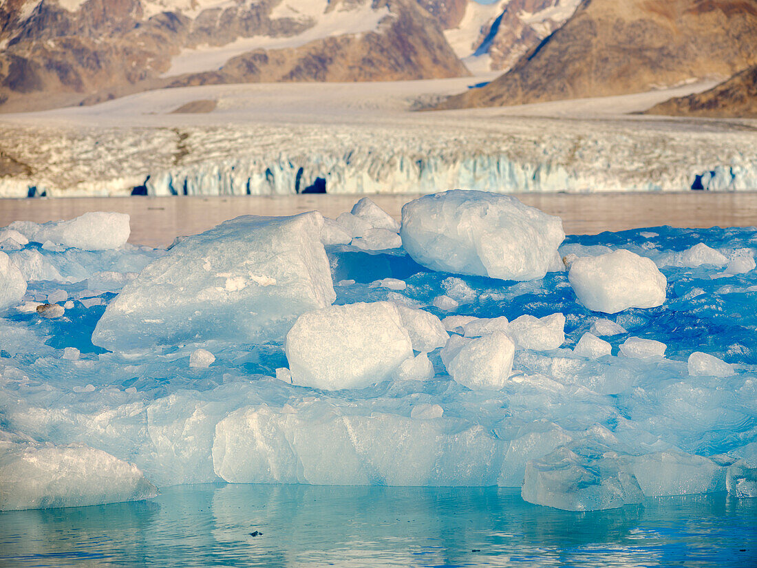 Iceberg in front of Knud Rasmussen Glacier (also called Apuseeq Glacier) in Sermiligaaq Fjord, Ammassalik, Danish Territory.