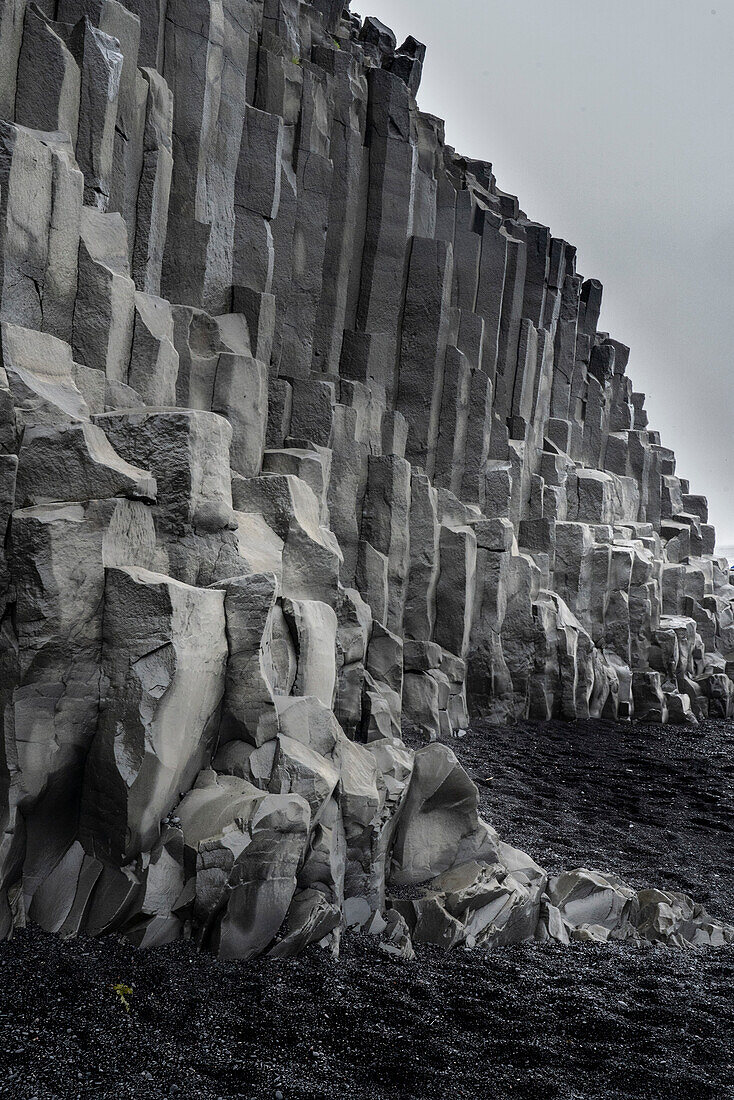 Iceland. Black beaches and columnar volcanic cliffs of Reynisfjara, Ring Road.