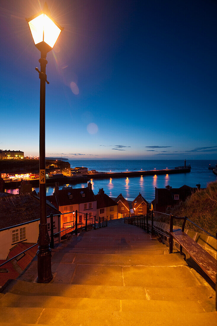 Steps Illuminated By Street Light At Dusk