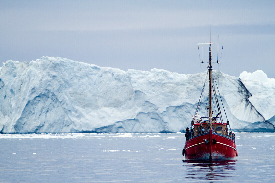 A Midnight Cruise Around The Ilulissat Ice Fjord, One Of Unesco World Heritage Sites. Greenland.