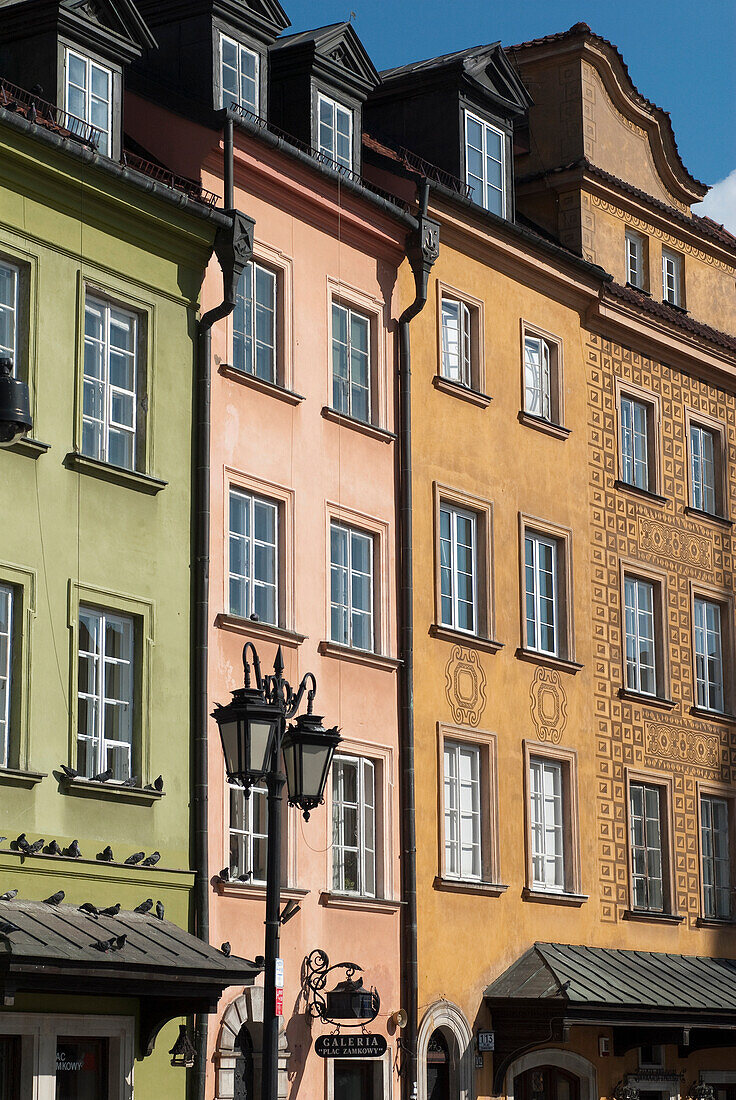 Detailed facades on burgher houses in Zamkowy Square (Plac Zamkowy) which were rebuilt after the Second World War and now form the UNESCO World Heritage Site Old Town district of Warsaw, Poland