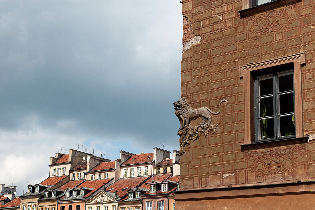 Lion motif on a wall of a late-Renaissance style burgher house near the market square of the UNESCO World Heritage Site Old Town district of Warsaw, Poland