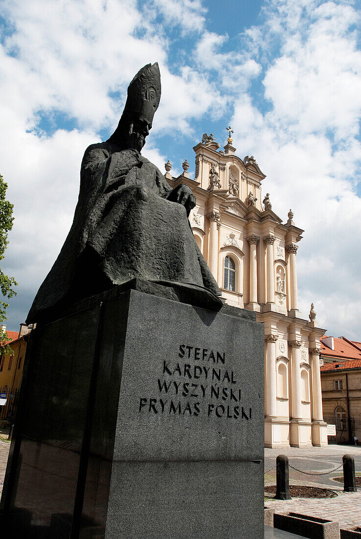 A statue of Cardinal Stefan Wyszynski, primate of Poland from 1948 to 1981 in front of the Rococo-styled (late-Baroque) Roman Catholic Church of St Joseph of the Visitationists, on Krakowskie Przedmiescie, Warsaw, Poland