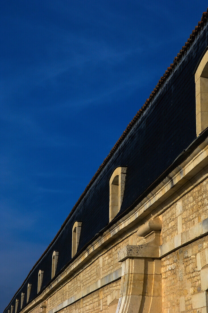 Low Angle View Of The Exterior Of Corderie Royale In Rochefort Sur Mer; Rochefort Sur Mer, France