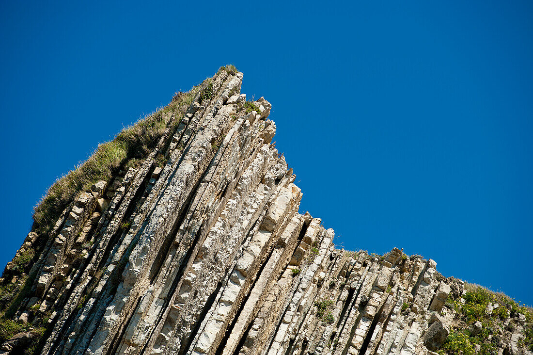 Sedimentary Rocks Known As Flysch In Itzurun Beach, Zumaia, Basque Country, Spain