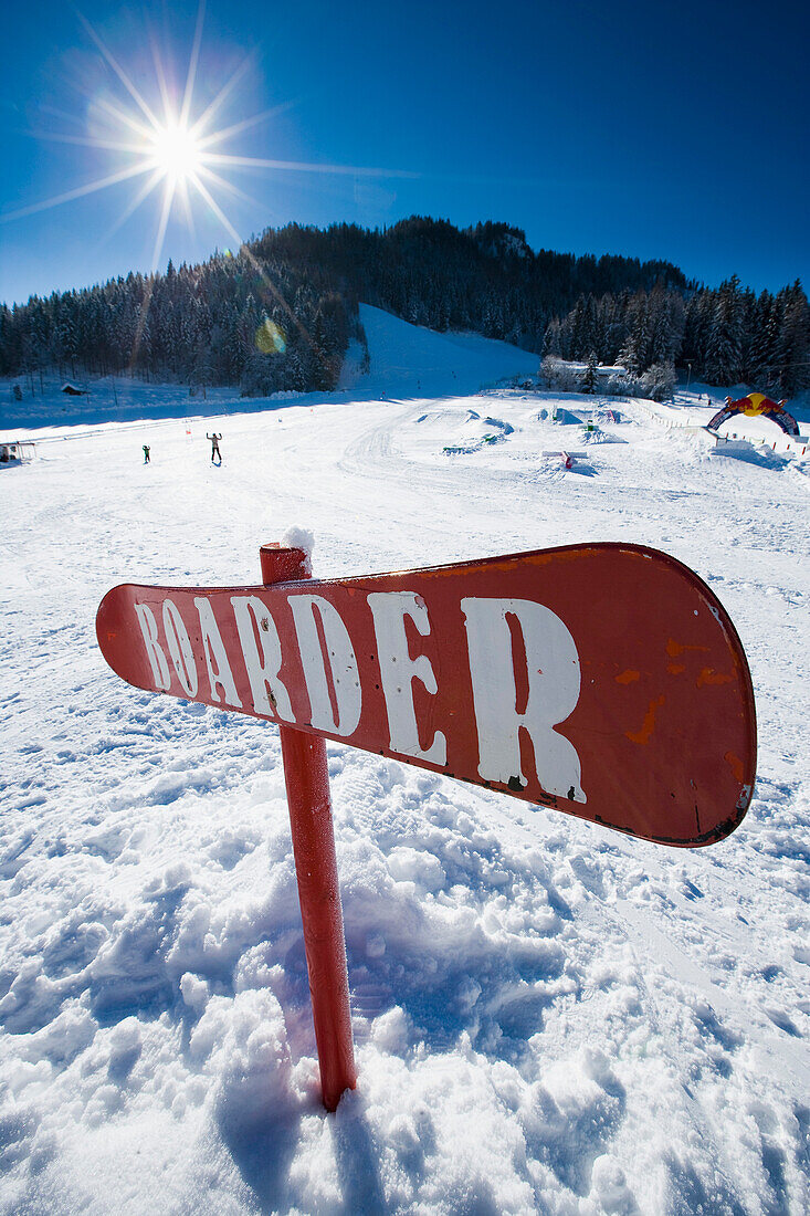 Ski Slope With Snowboard Sign Saying 'boarder' At Ski And Snowboard Resort In Waidring, Austrian Alps, Austria