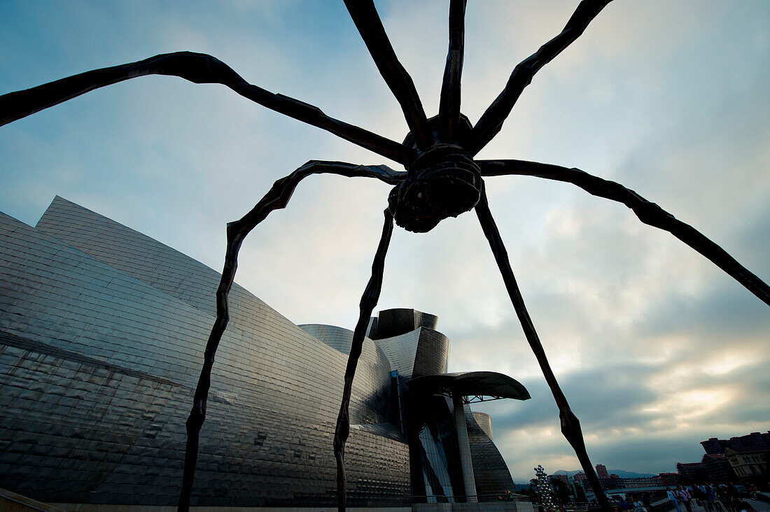 Louis Burgeois Sculpture In Front Of Guggenheim Museum In Bilbao, Basque Country, Spain