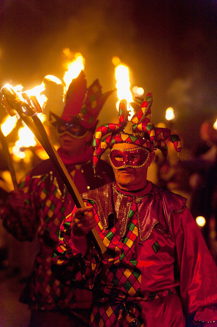 Men Dressed As Jester At Bonfire Night In Mayfield, East Sussex, Uk