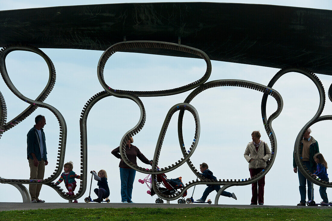 People Enjoying At 'the Longest Bench', Littlehampton, West Sussex, Uk