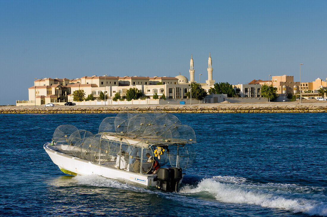 United Arab Emirates, Fishing boat leaving harbour; Ras Al Khaimah