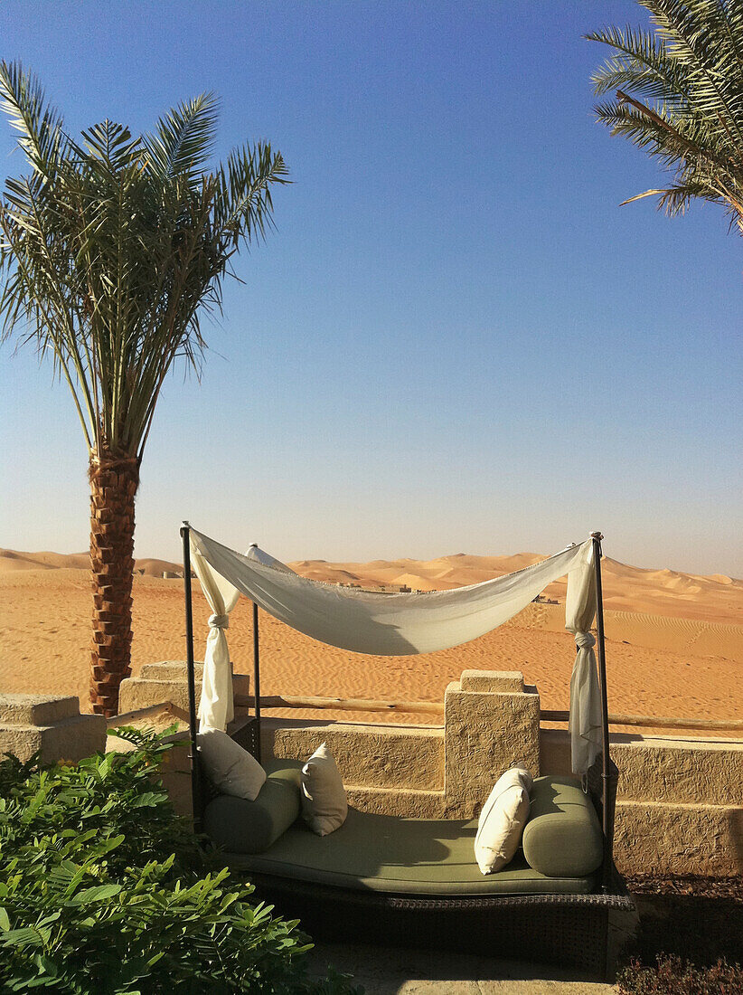 United Arab Emirates, Abu Dahbi, Qasr al Sarab, Poolside seating and dunes