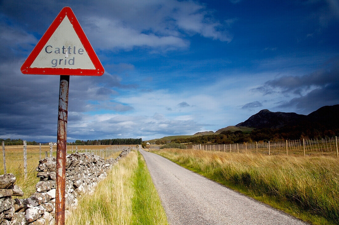 United Kingdom, View of road and road sign; Scotland