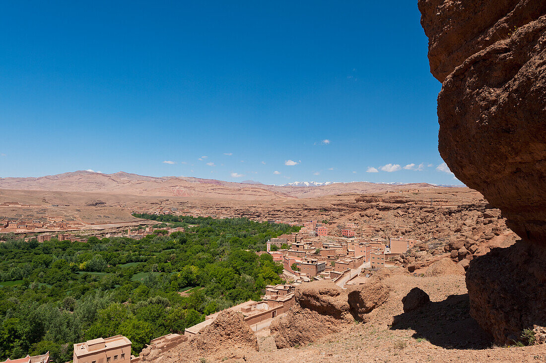 Morocco, Villages and greenery with Atlas mountains behind; Valley of Roses