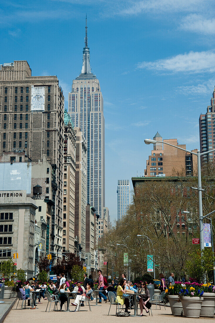 People Enjoying The Sun In A Terrace In Madison Square Park, Manhattan, New York, Usa