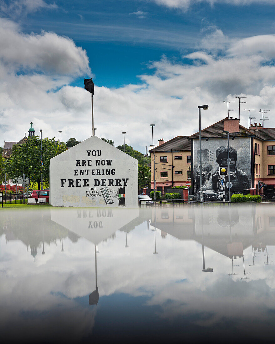 United Kingdom, Northern Ireland, County Londonderry, Reflected view of murals in Bogside Area; Derry