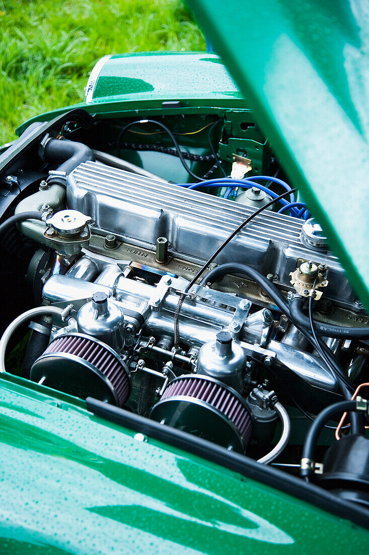 United Kingdom, England, Devon, Close-up of MGB GT engine; Uffculme