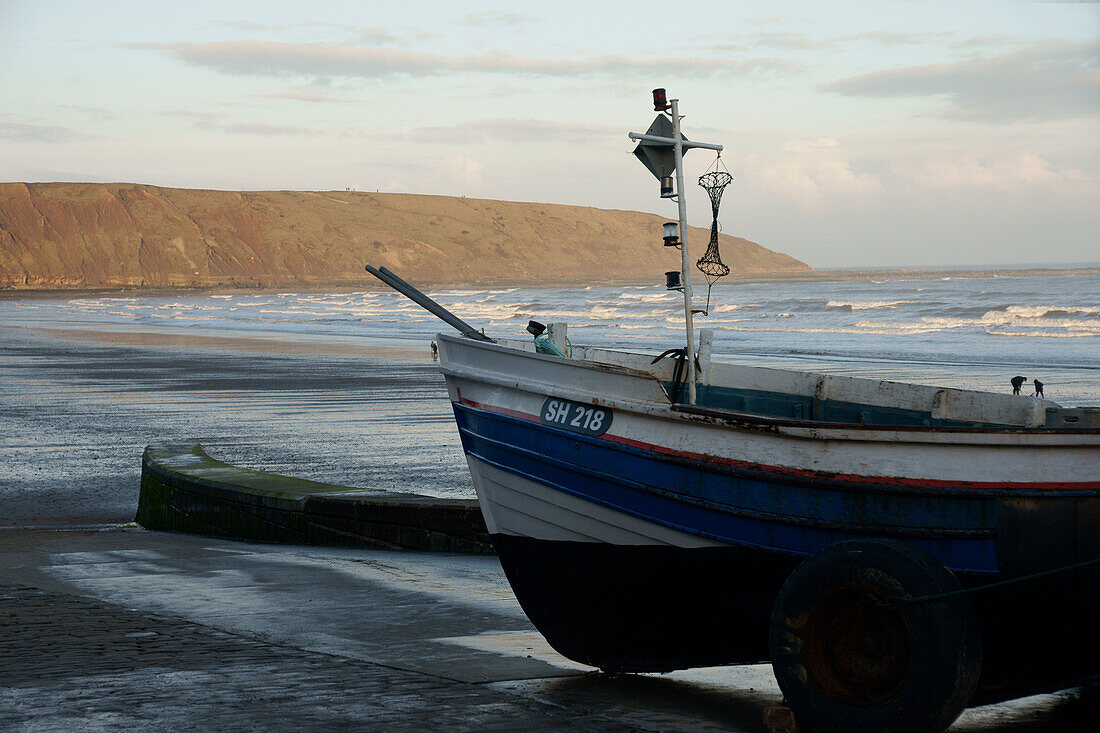 Fishing Boats And Filey Brig; Filey, Yorkshire, England