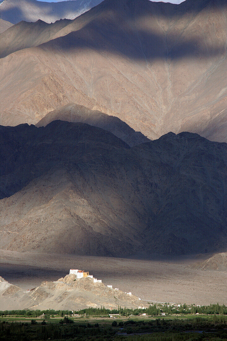 India, Buddhist monastery at foot of mountain; Ladakh
