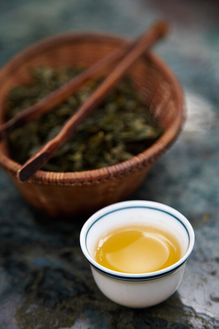 Teacup and loose tea Maokong tea plantation Taipei Taiwan