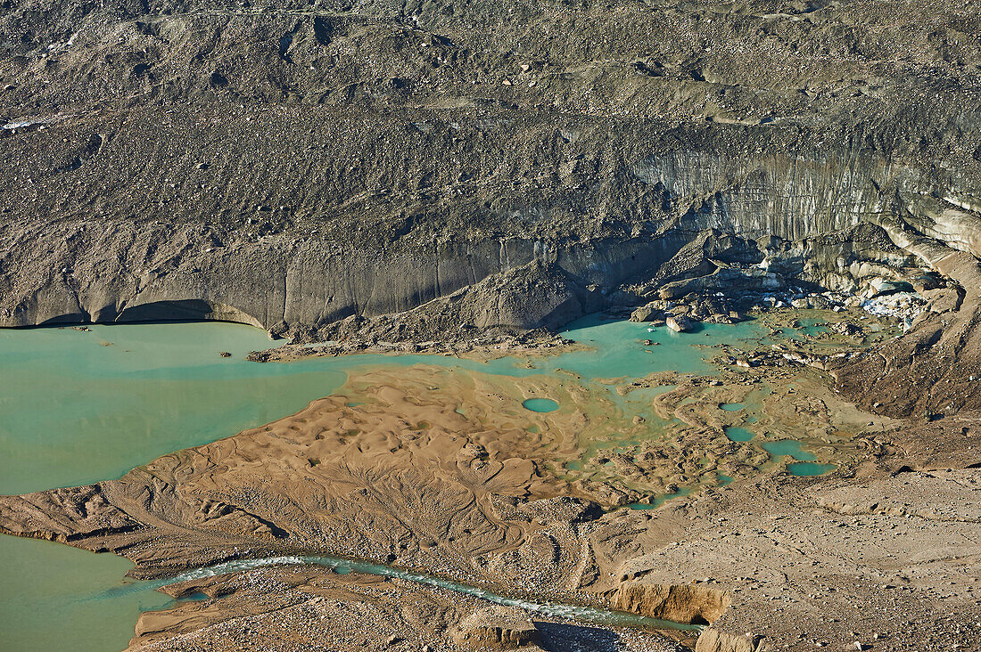 Lake of Glacier Pasterze from Gamsgrubenweg with its turquoise, muddy water and surrounding glacial ice mass, Franz-Joseph-Höhe on an early morning; Kärnten (Carinthia), Austria