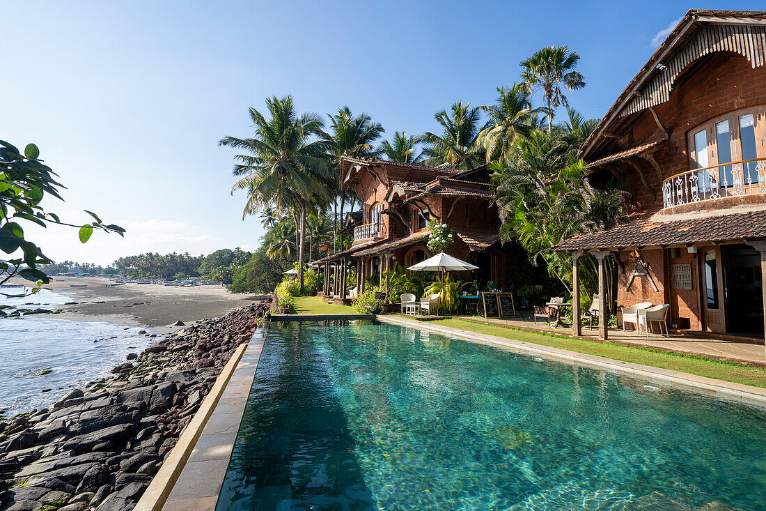 Infinity pool and shoreline at Ahilya by the Sea; Nerul, Goa, India