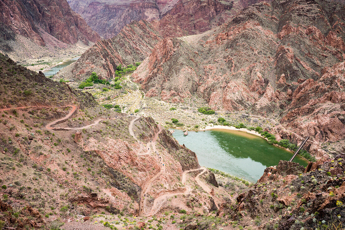 Hikers on the South Kaibab Trail near The Colorado River in The Grand Canyon.; Grand Canyon National Park, Arizona