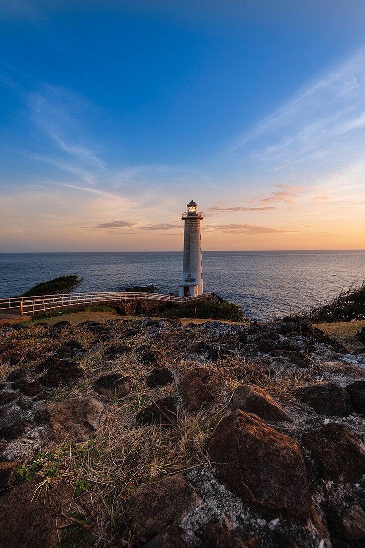 Lighthouse at Pointe du Vieux Fort overlooking the Caribbean Sea at sunset, southernmost point of Guadeloupe; Basse-Terre, Guadeloupe, French West Indies