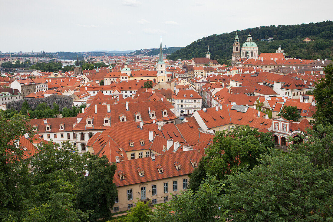 The cityscape and rooftops of Prague are visible from Prague Castle.; Prague, Czech Republic