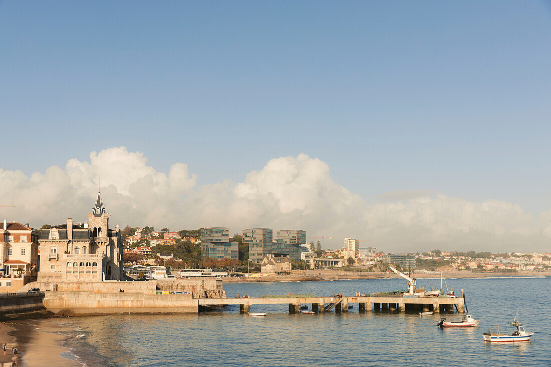 Coastal resort town of Cascais with view of Seixas Palace along the Atlantic Ocean at Ribeira Beach; Cascai, Lisbon, Portugal