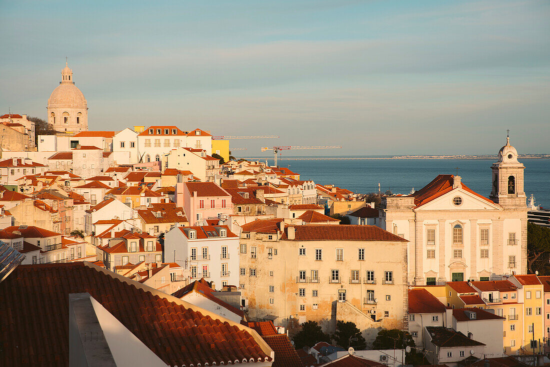 The City of Lisbon's Old Quarter, Alfama, at sunset; Lisbon, Portugal