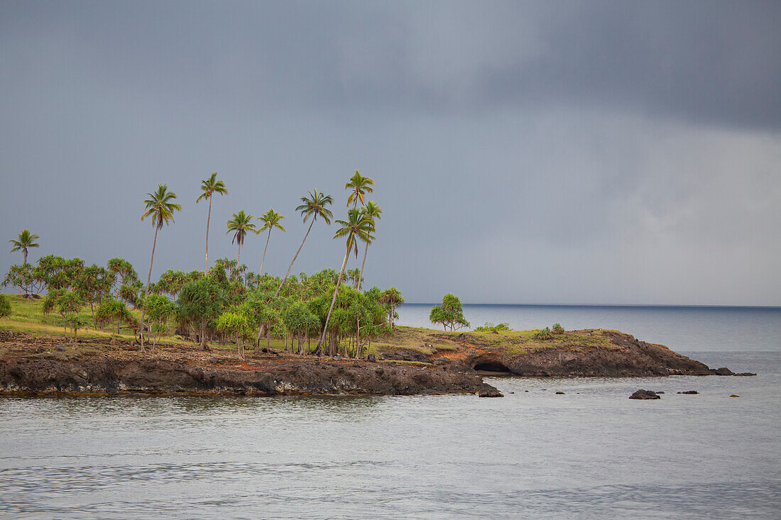 Stormy skies over the Tufi peninsular on the Cape Nelson peninsula; Tufi, Oro Province, Papua New Guinea