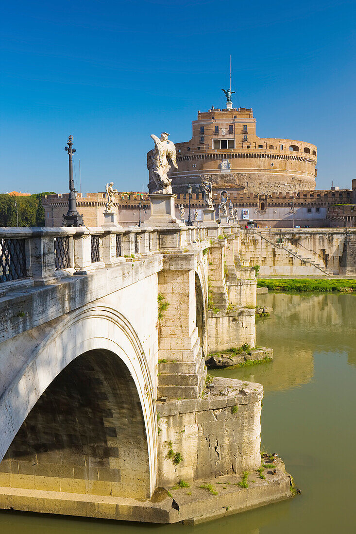 Ponte Sant'Angelo crossing the River Tiber with view of the Castel Sant'Angelo; Rome, Lazio, Italy