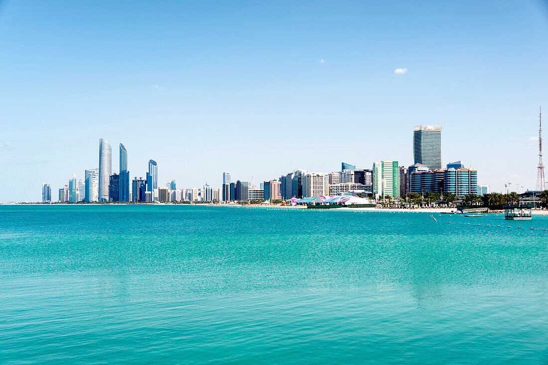 Abu Dhabi skyline and beaches viewed from the Marina Island Roadway in Abu Dhabi City; Abu Dhabi, United Arab Emirates