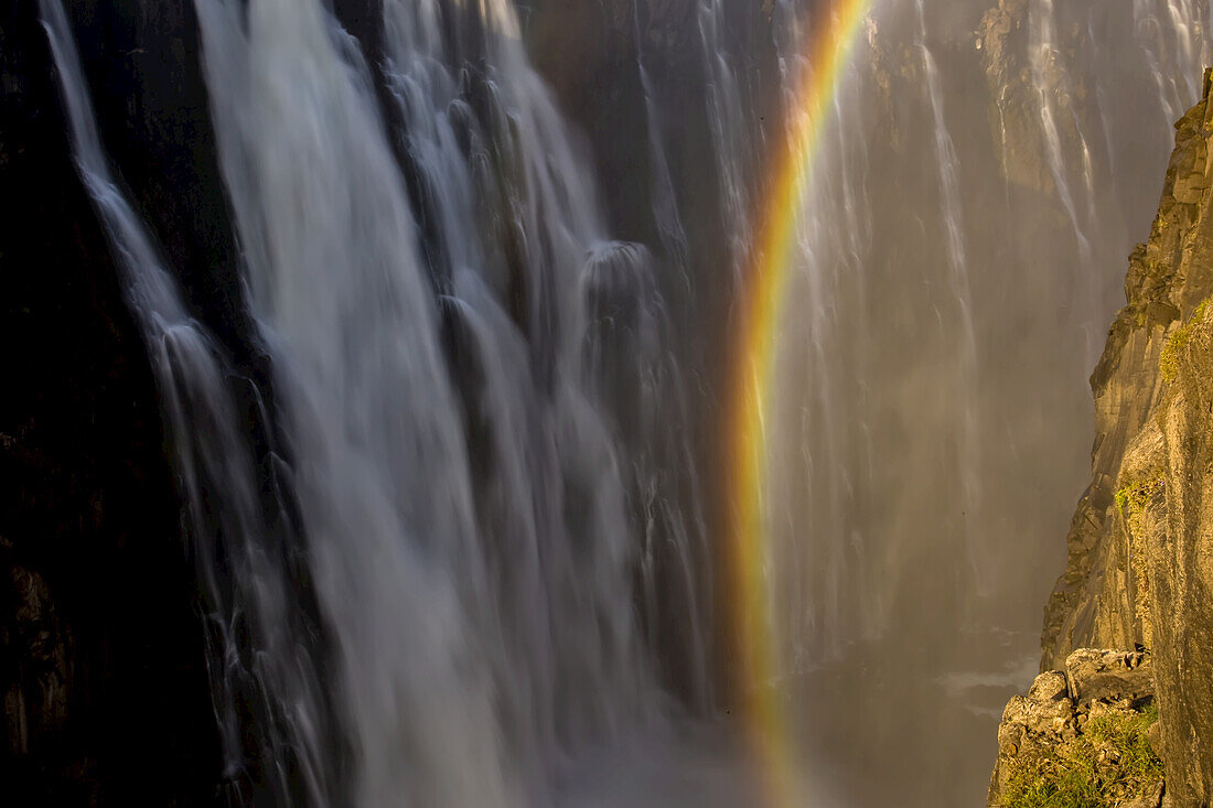 A rainbow created in the mist of Victoria Falls.