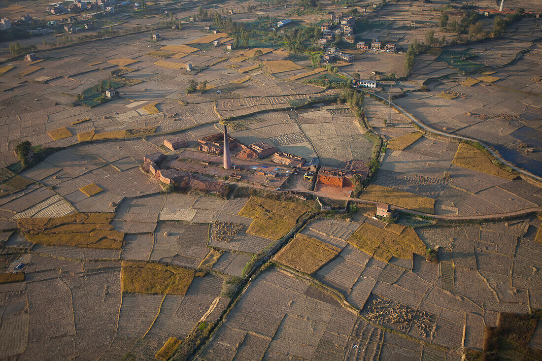 A brick factory among farms.