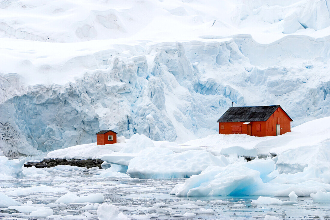 Argentinian research station at water's edge of Antarctic peninsula.