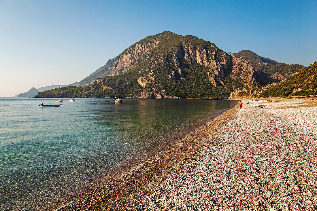 An early morning view of the Mediterranean Sea along Cirali beach looking southwards towards Olympos, near Kemer, on the Mediterranean coast of Anatolia;  Cirali Beach, Anatolia, Turkey