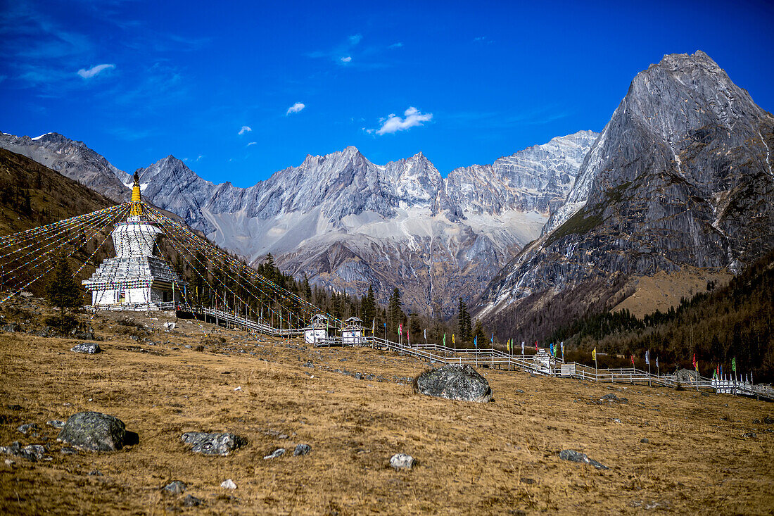 Buddhist prayer flags and stupa in the mountains, Mount Siguniang National Park; Ngawa Prefecture, Sichuan, China