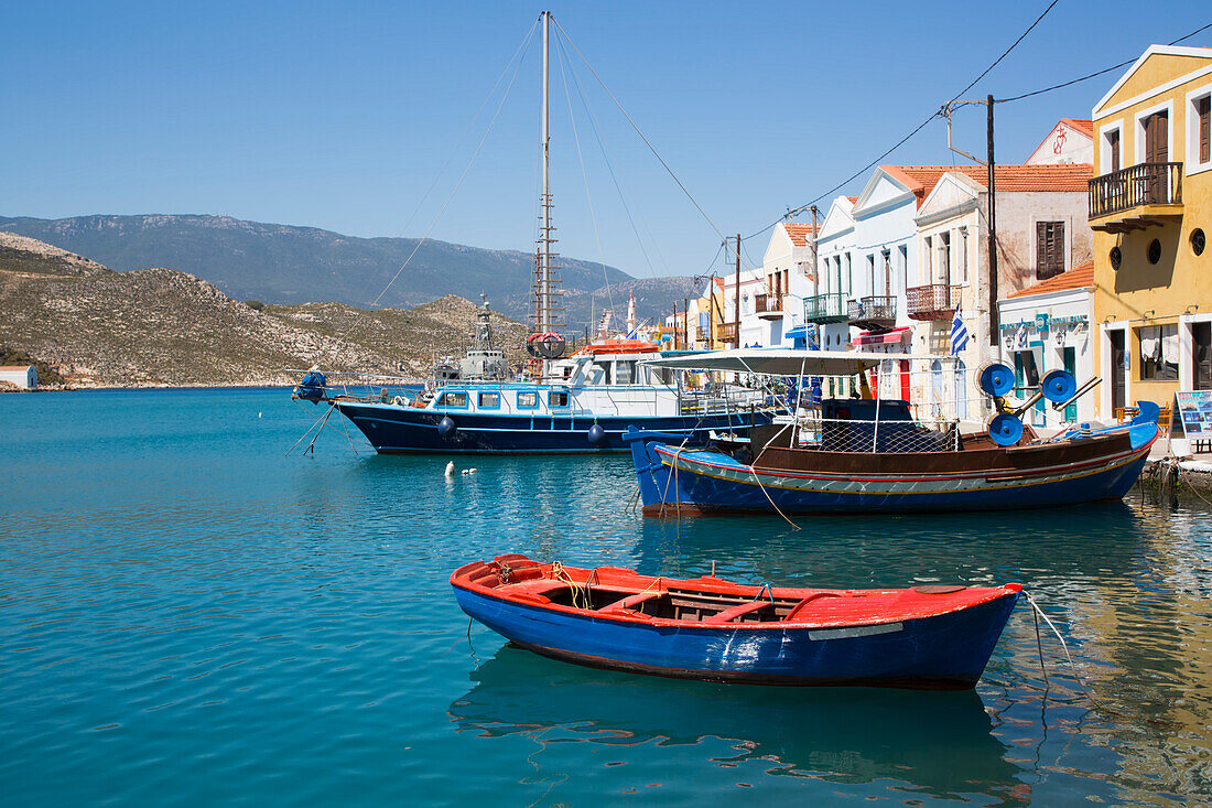 Boats moored in the harbor of the historical island of Kastellorizo (Megisti) Island; Dodecanese Island Group, Greece