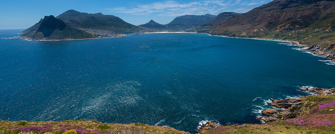 Sentinel Peak at the mouth of Hout Bay and the shoreline along the Atlantic Ocean; Cape Town, Western Cape, South Africa