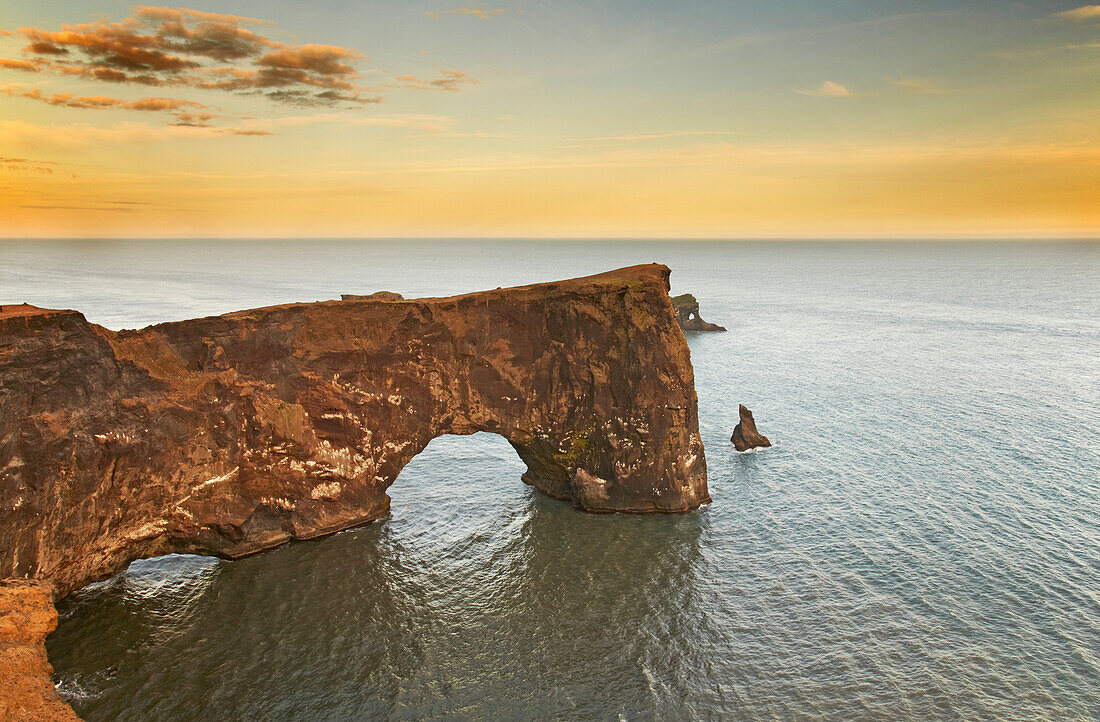 A rock arch in the cliffs of Dyrholaey Island, near Vik, Iceland.; Dyrholaey Island, Iceland.