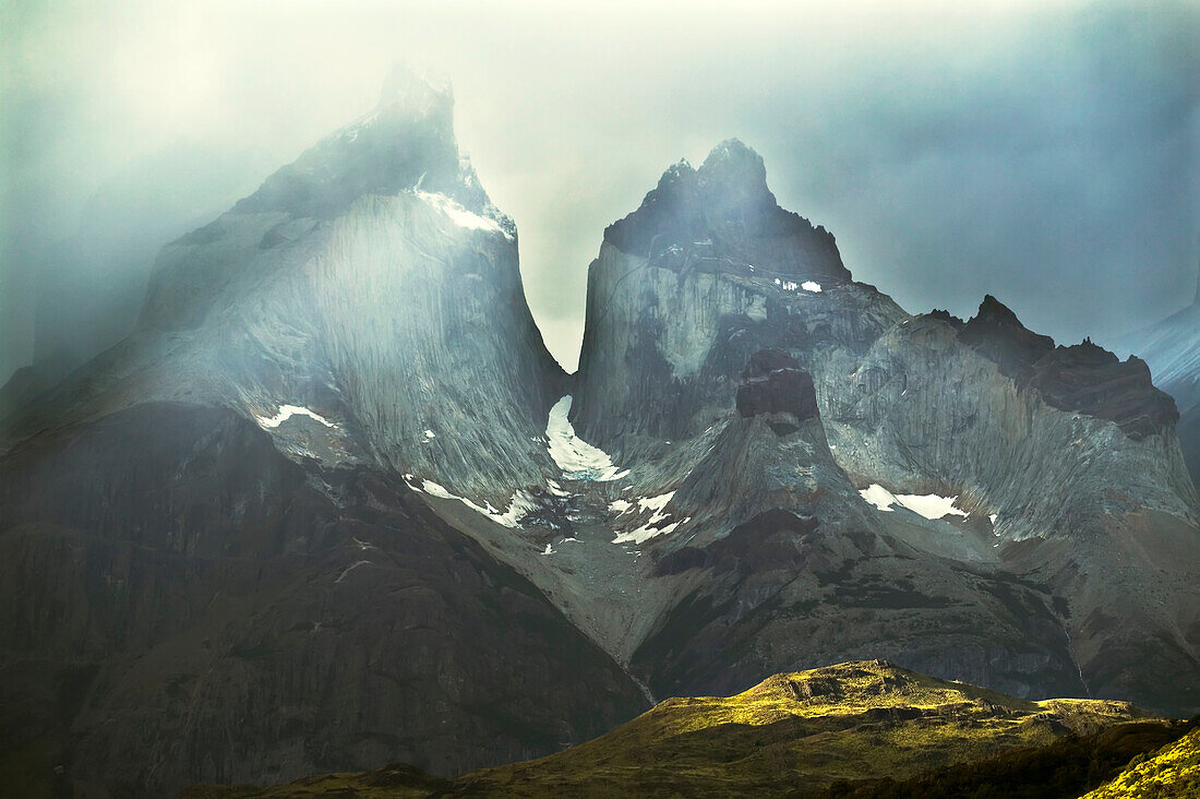 Stormy light on mountains in Torres del Paine, Patagonia, Chile.; Cuernos del Paine, Torres del Paine National Park, Patagonia, Chile.