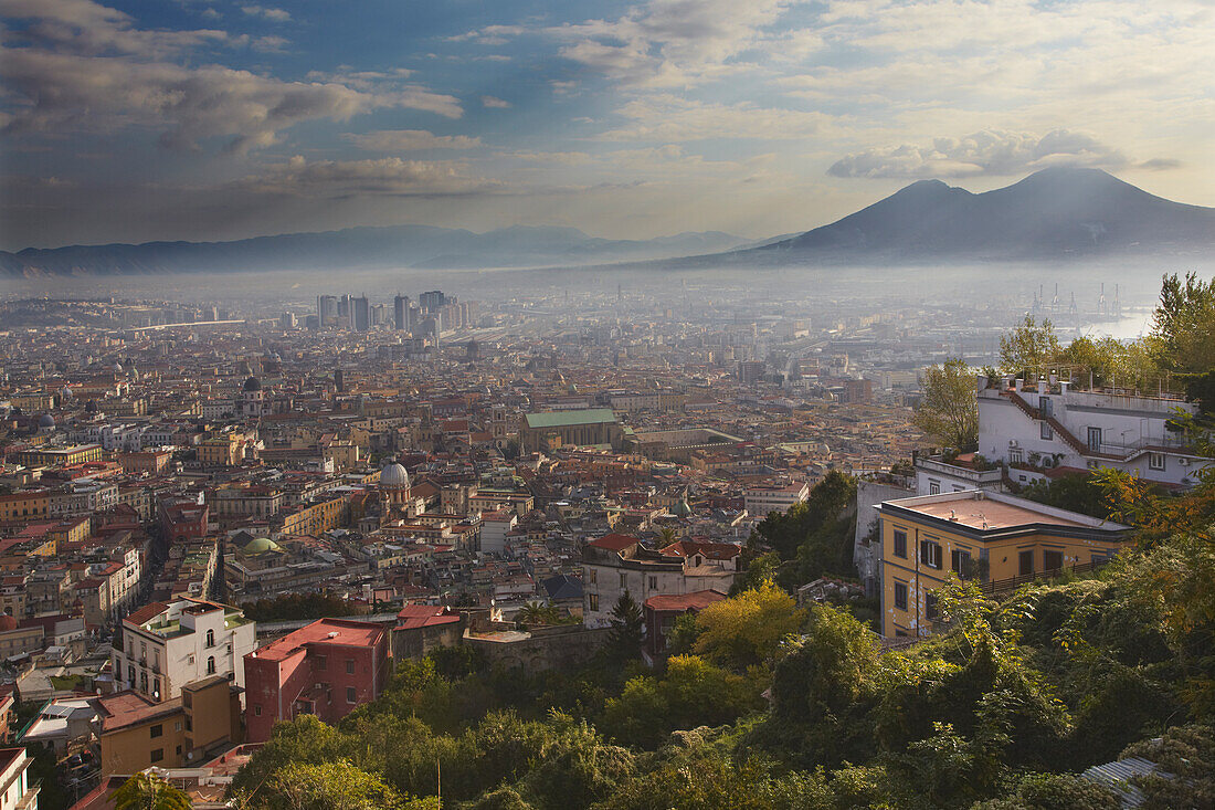 An early morning view of Naples and Mt Vesuvius, Italy.; A view seen from Castel Sant'Elmo of Naples and Mt Vesuvius, Italy.