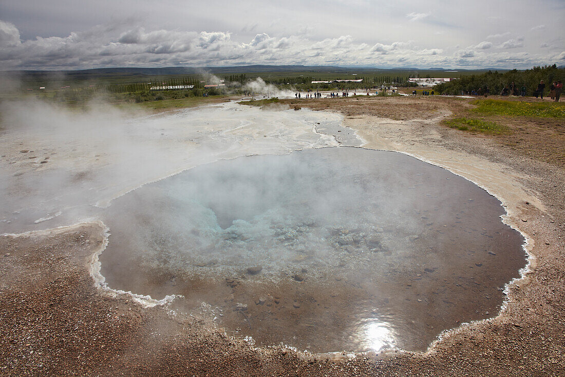 The Blesi hotspring pool steaming, at Geysir, southwest Iceland.; Geysir, Iceland.