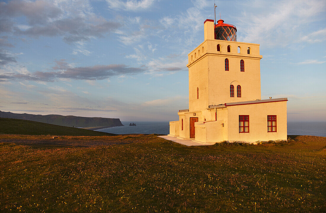 The lighthouse on Dyrholaey Island, near Vik, Iceland.; Dyrholaey Island, Iceland.