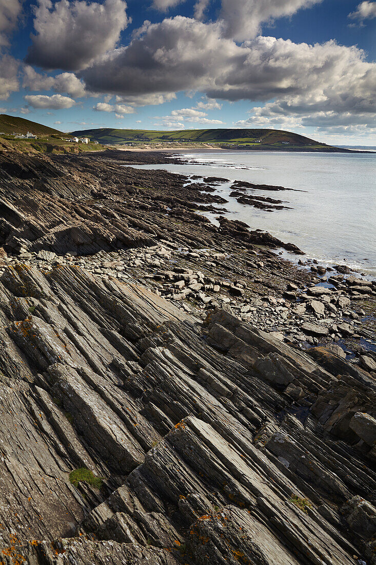 A rocky shoreline on the rugged Atlantic Coast at Baggy Point near Croyde Bay in Devon; Southwest England, Great Britain, United Kingdom